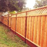 neighbor’s fence on my property in Huntsville AL